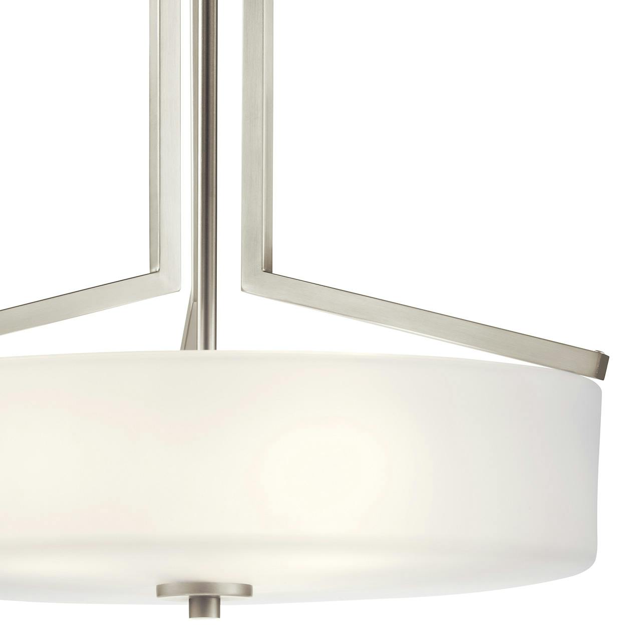 Close up view of the Skagos™ 3 Light Pendant Brushed Nickel on a white background