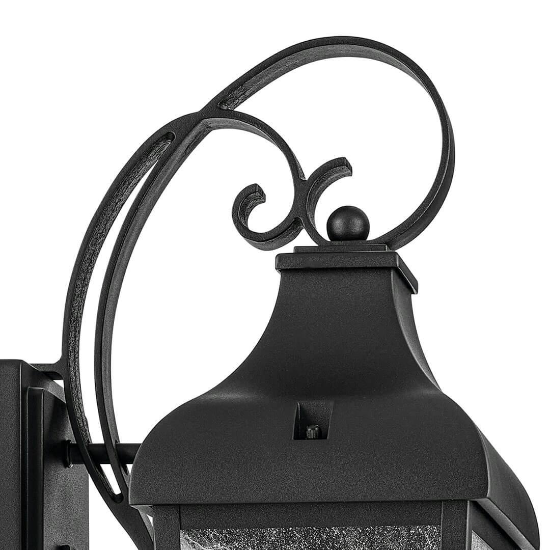 Close up view of the Forestdale 30.75" 3-Light Outdoor Wall Light in Textured Black on a white background