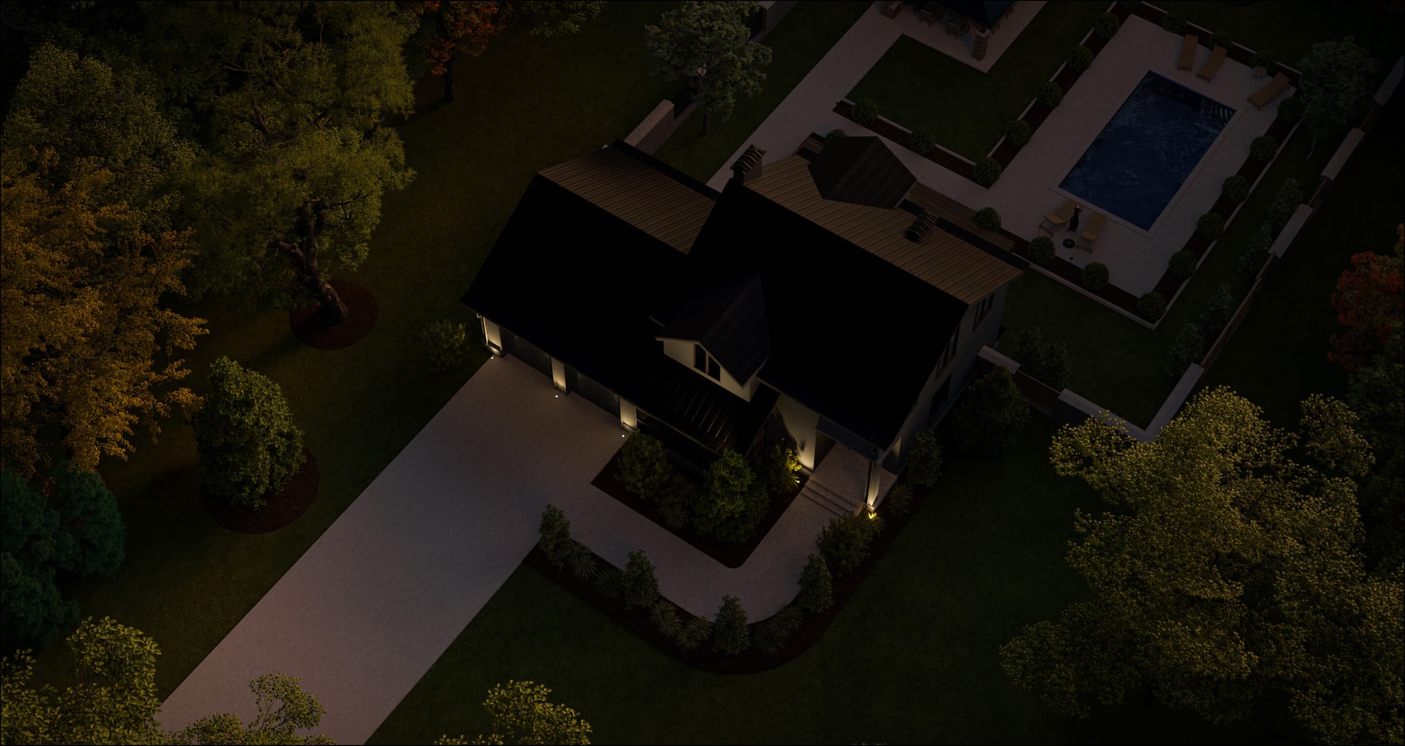 Arial image of a house showing the front and backyard with just accent lights shinning on the front of the house turned on at night 