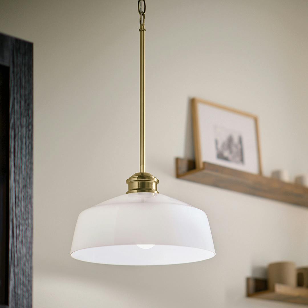 Day time flat featuring the Renneker 1 Light Pendant in Brushed Natural Brass