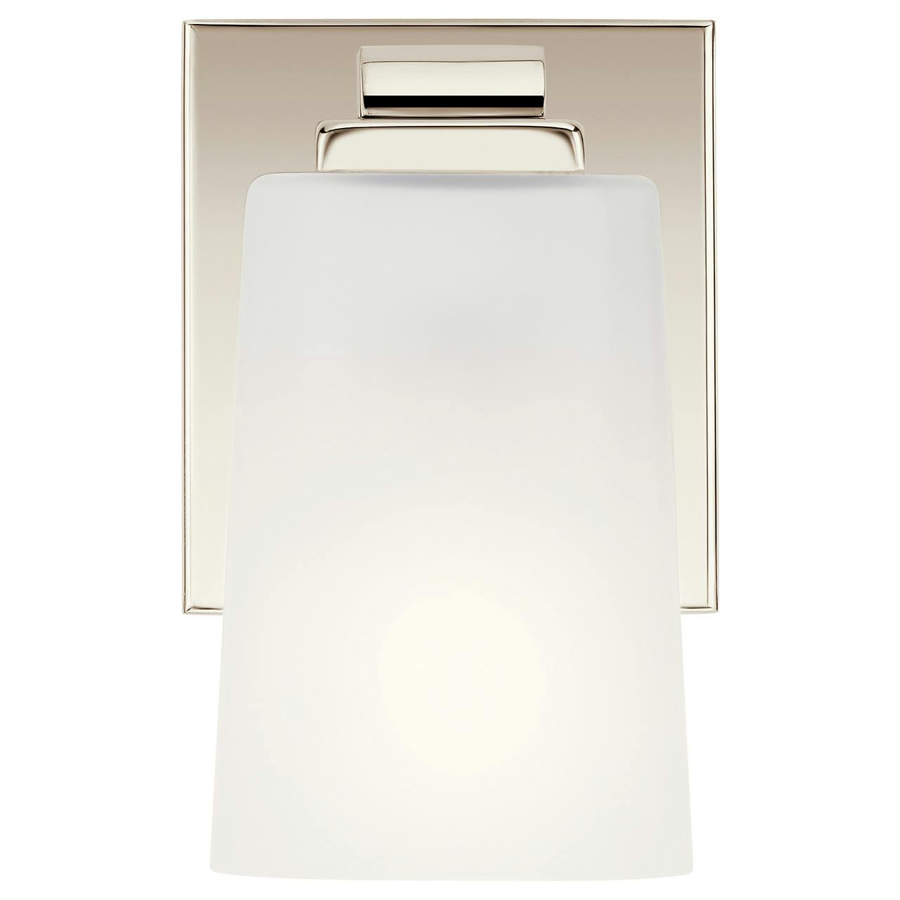 The Roehm 1 Light Wall Sconce Polished Nickel facing down on a white background