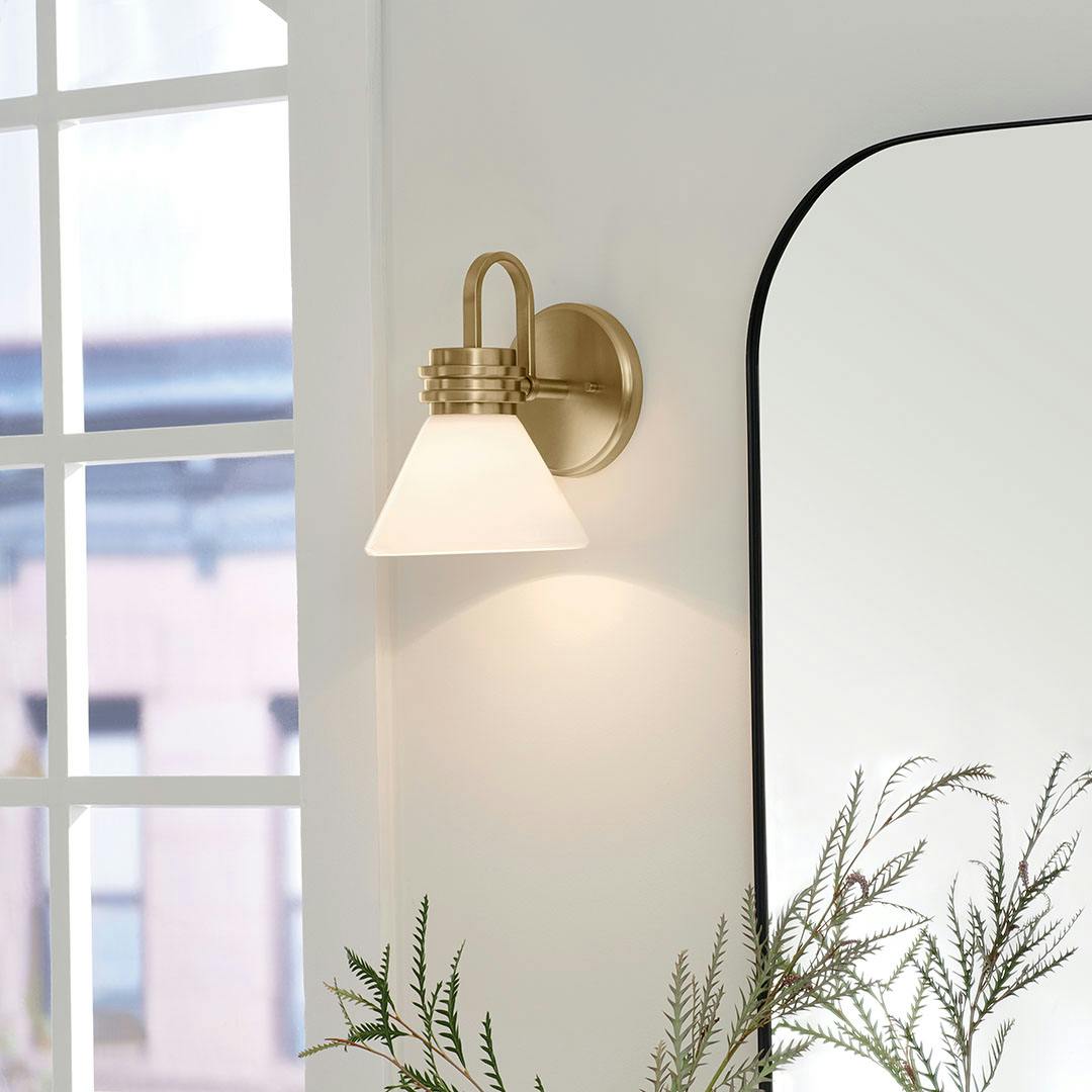 Day time bathroom with the Farum 9.5 Inch 1 Light Wall Sconce with Opal Glass in Champagne Bronze