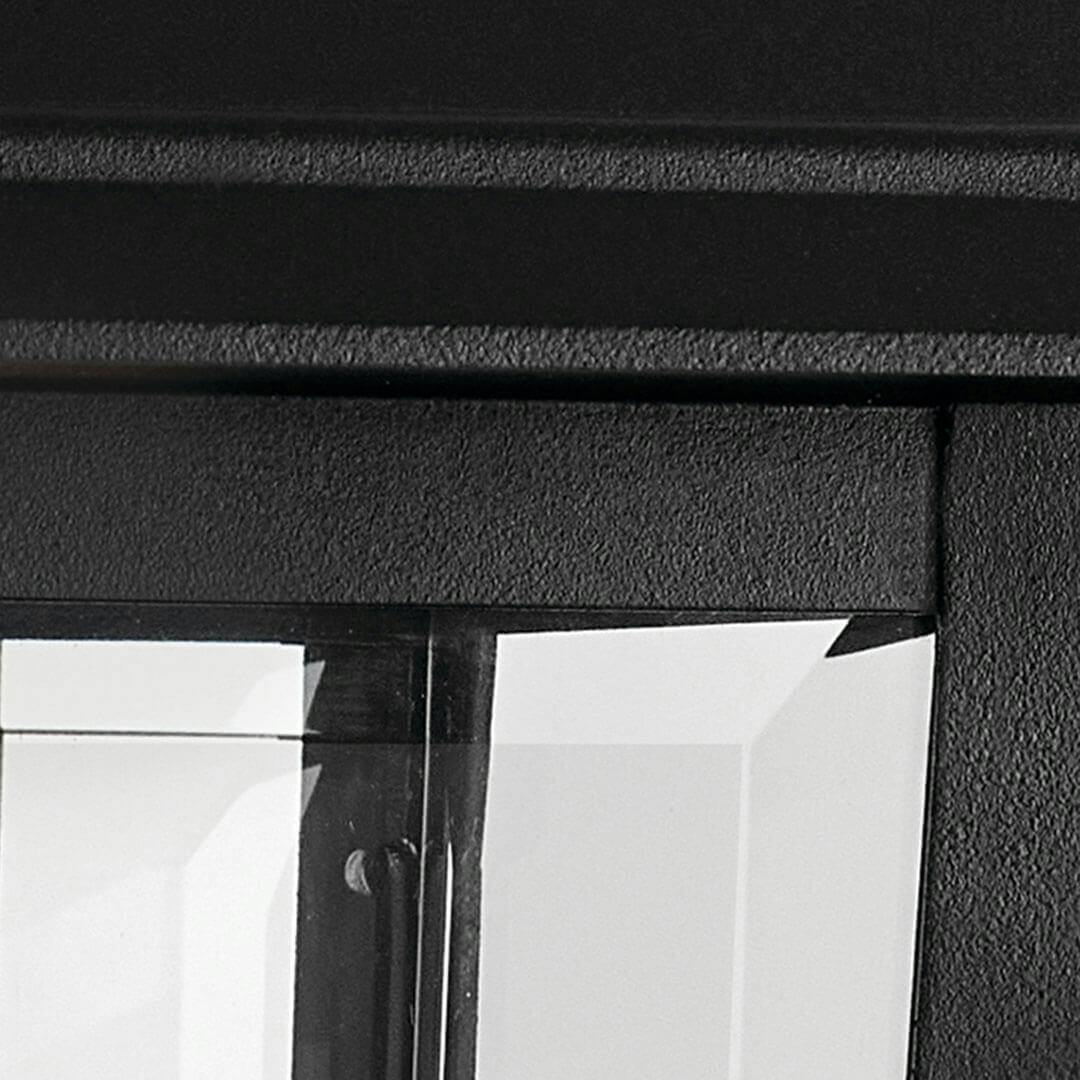 Close up of the Mathus 18" 1 Light Outdoor Wall Light with Clear Glass in Textured Black on a white background