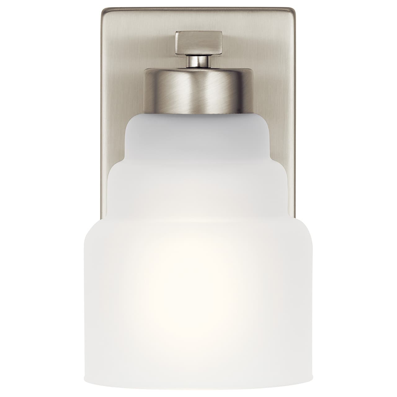 The Vionnet 8.5" 1 Light Sconce in Nickel facing down on a white background