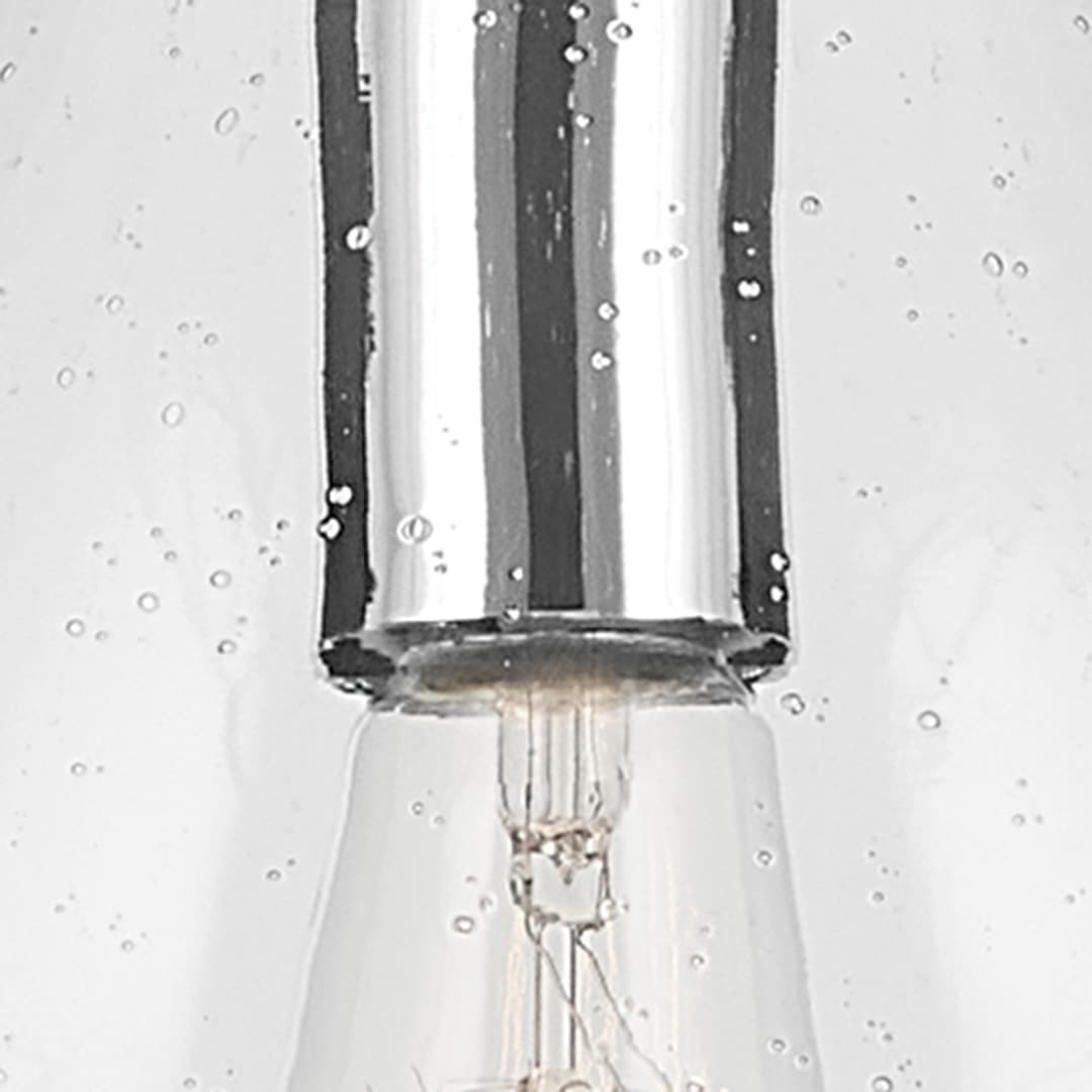 Close up view of the Everly 17.75" 1-Light Bell Pendant with Clear Seeded Glass in Chrome on a white background