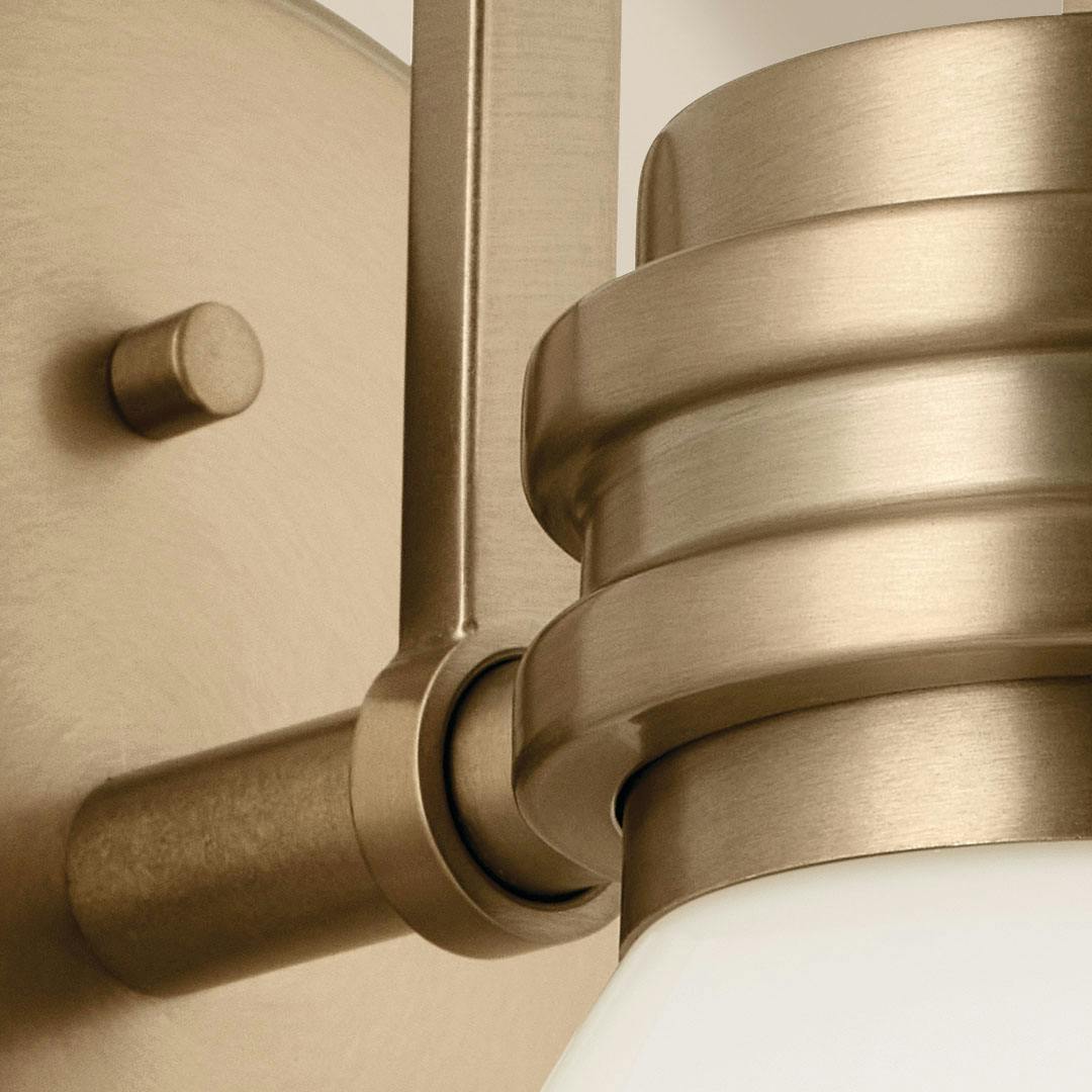 Close up of the Farum 9.5 Inch 1 Light Wall Sconce with Opal Glass in Champagne Bronze