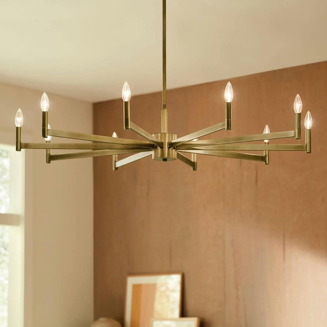 Den in the day light with the Erzo 48" 10 Light Chandelier in Natural Brass
