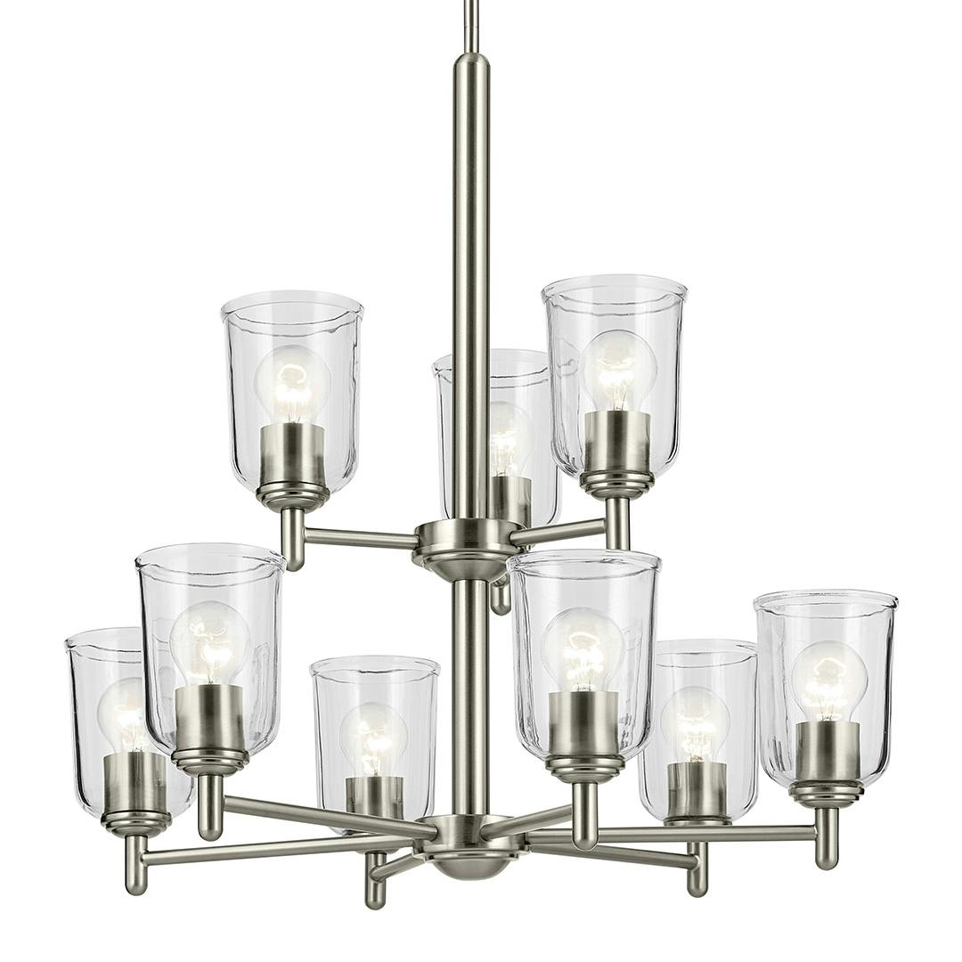 The Shailene 26.5" 9-Light 2-Tier Chandelier with Clear Glass in Brushed Nickel on a white background